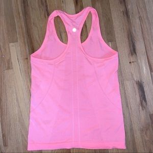 Bright orange lululemon tank